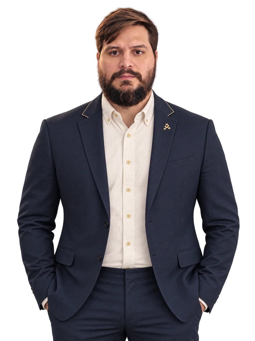 Alexsandro Freitas, Appfy’s human founder, in a navy jacket and cream shirt.