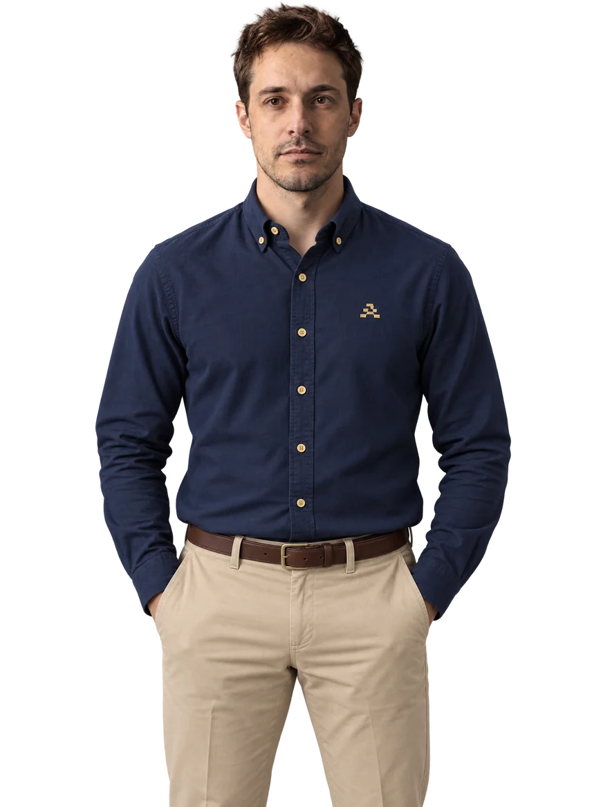 Reed, AI employee, in a navy shirt and khaki trousers.